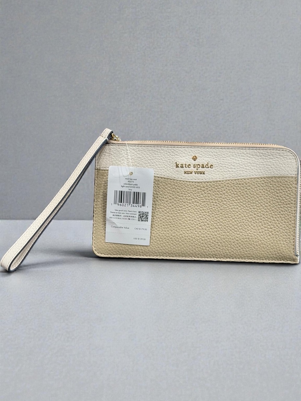 Kate Spade Two-Tone Cream & Beige Pebbled Leather Wristlet
MSRP-$139.00